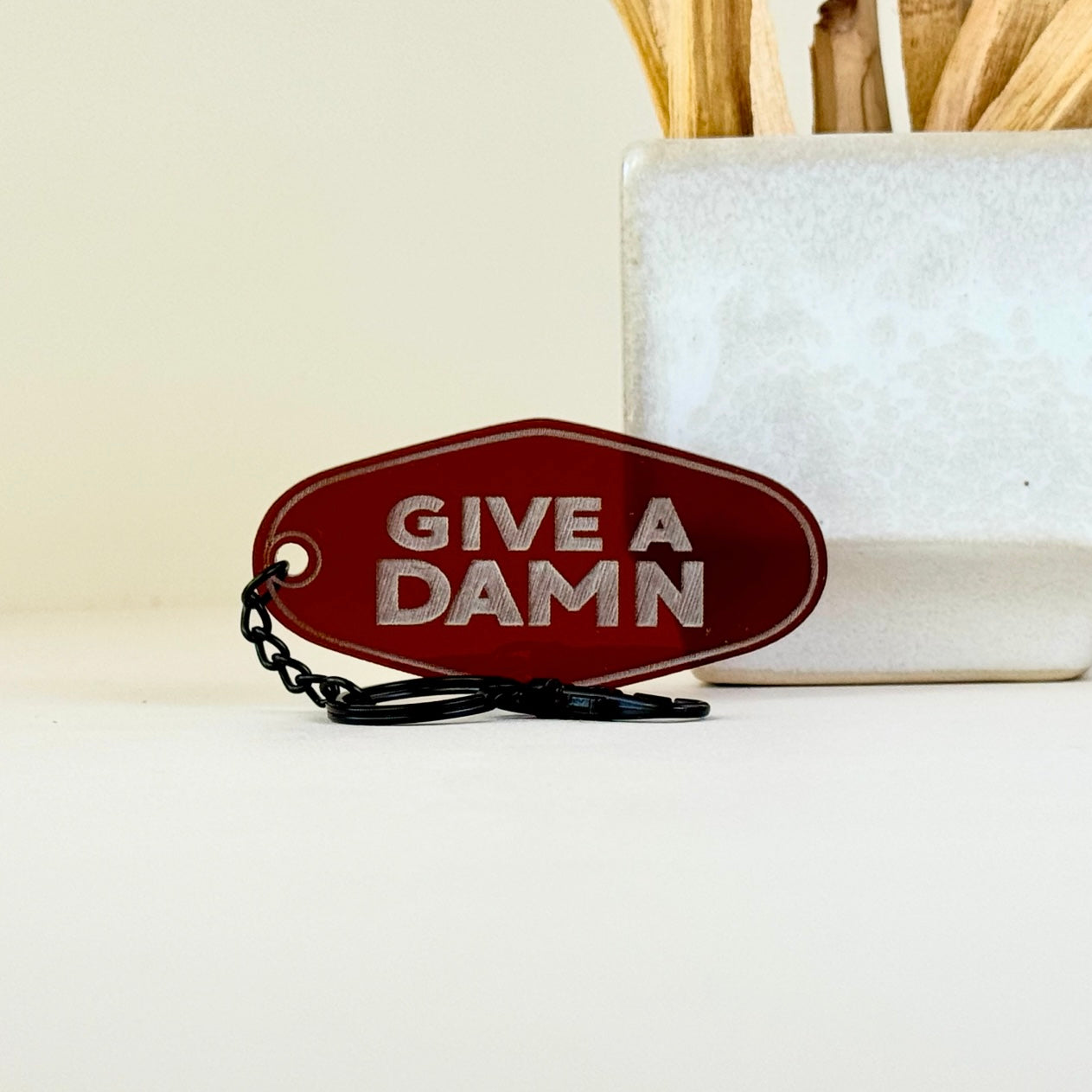 Give A Damn Hotel Keychain